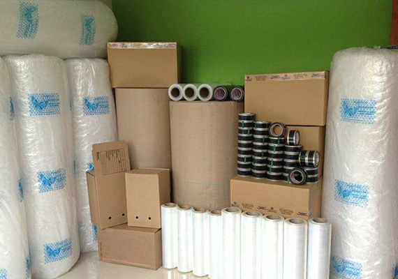JK Bros Packers and Movers supervisor checking a loaded moving truck in Bangalore
